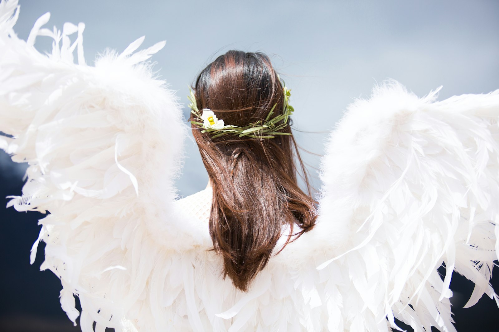 A woman wearing white angel wings, for a Pulse Report on the Victoria's Secret Fashion Show 2026